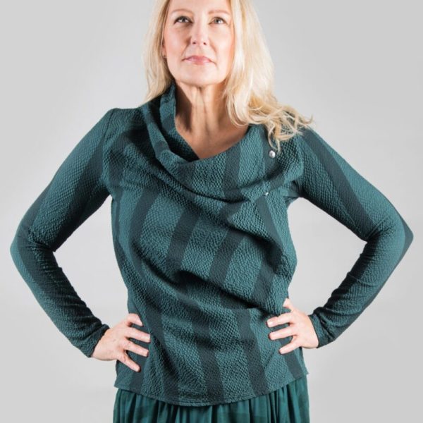 Elsewhere B-Yikama striped petrol green top is unconventional in its design with a draping front. Available from colmershill.com
