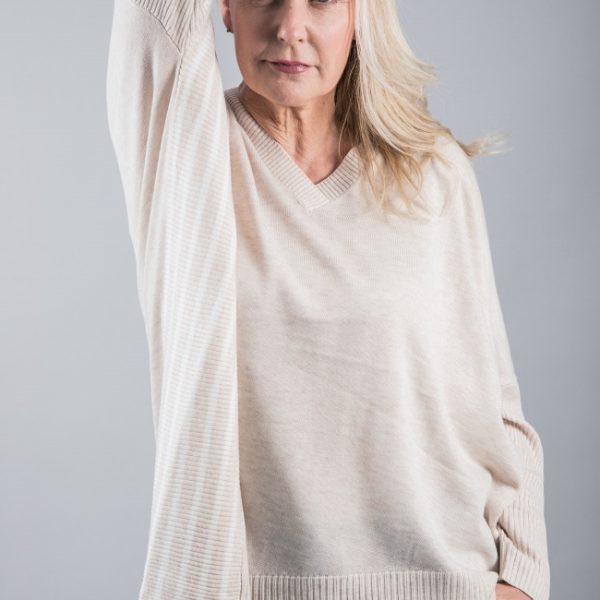 Foil Converging Tastes Sweater in Parchment with striped side panels and asymmetric hemline, available at colmershill.com