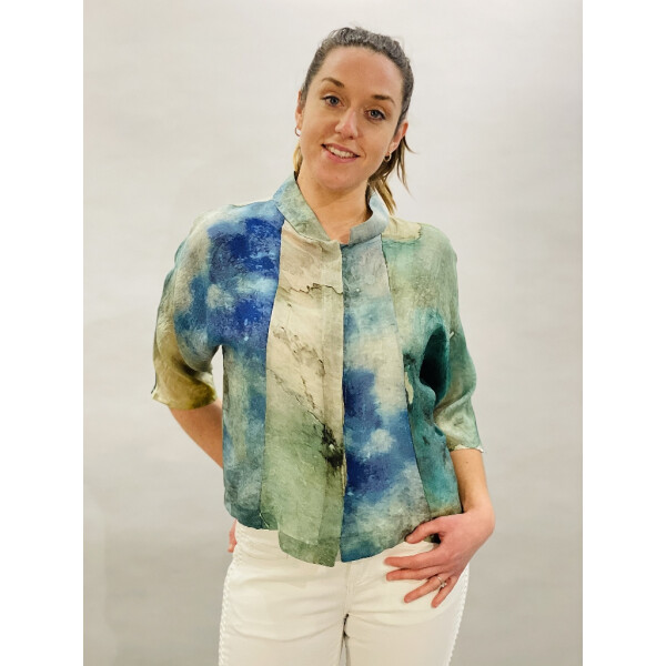 Yavi Silk Jacket with an impressionist print in blues and greens with accents of yellow. Available on colmershill.com