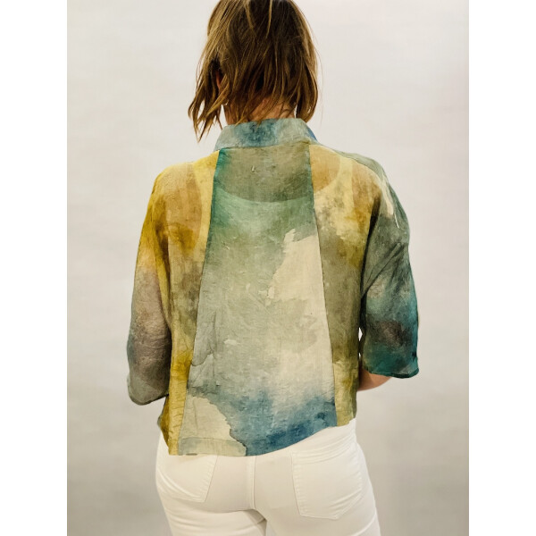 Yavi Silk Jacket with an impressionist print in blues and greens with accents of yellow. Available on colmershill.com