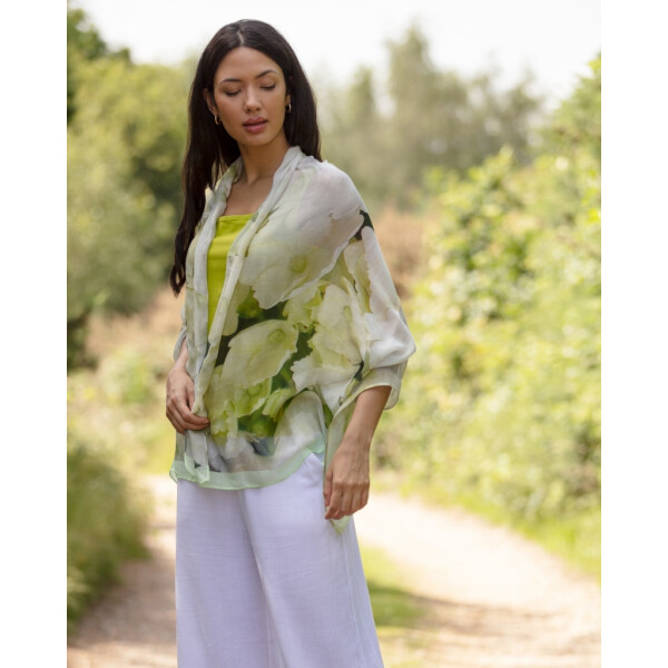 A beautiful scarf by new wearable art label, From My Mother’s Garden, in a soft, draping bamboo fabric. It has an exclusive White Hydrangea print called Peace. The exclusive Peace print has white and subtle pastel green shades. The scarf is semi-sheer and is light and very soft to the skin. Hydrangeas are one of my favourites in my mother’s small garden and she has a corner with a selection of hydrangea bushes all in different colours. Just love the many varieties of the hydrangea flowers. Bamboo Scarf Exclusive print White and pastel green 100% Bamboo 180 x 70cm 30c Machine Wash