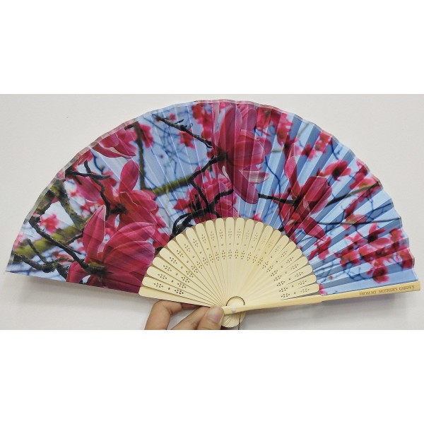 From My Mother's Garden hand opening hand fans are handmade in the traditional Oriental and Japanese style using the exclusive nature-inspired prints from the range. The Hope fan has neutral coloured spines and and handle with a turquoise and pink Magnolia print. They come with a matching pouch. Available on top UK stockist colmershill.com