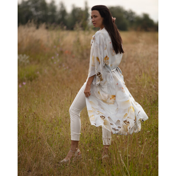 From My Mother's Garden Peace Long Robe is a relaxed gown which can be worn as a dressing gown or duster coat. Made of sustainable fabric it is a beautiful piece which would be lovely for a bride to be on the wedding day. Very feminine. Available from top UK stockist colmershill.com
