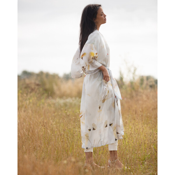 From My Mother's Garden Peace Long Robe is a relaxed gown which can be worn as a dressing gown or duster coat. Made of sustainable fabric it is a beautiful piece which would be lovely for a bride to be on the wedding day. Very feminine. Available from top UK stockist colmershill.com