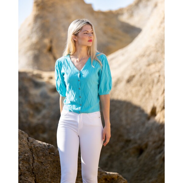 Marble Reversible Cardigan in Aqua can be worn two-ways so that you either have a round neck on the front or a V-neck. It has 3/4 length sleeves with a pleated detail. Available on Colmershill.com