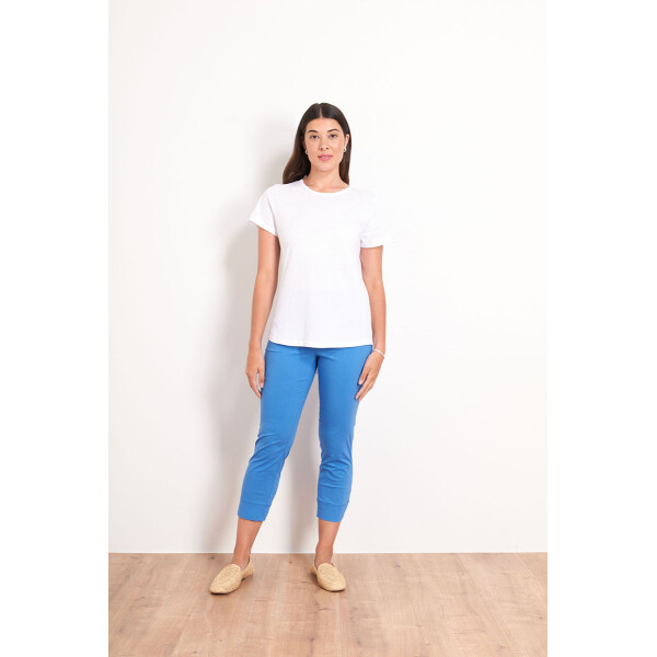 Foil Riveting 7/8 Taper Pants in Azure Blue are made of a very lightweight stretch cotton which is perfect for holidays and sunny weather. Super popular!
