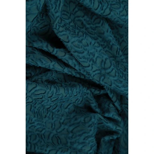 Grizas Draping Jacket Dark Teal has a floral textured pattern. It folds loosely on the opening making it a beautiful, elegant jacket. Available on Colmershill.com, UK stockist of Grizas