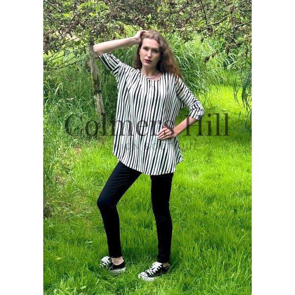Kozan jersey black and white stripe tunic top with a soft curve to the hemline and batwing sleeves which are three quarter length