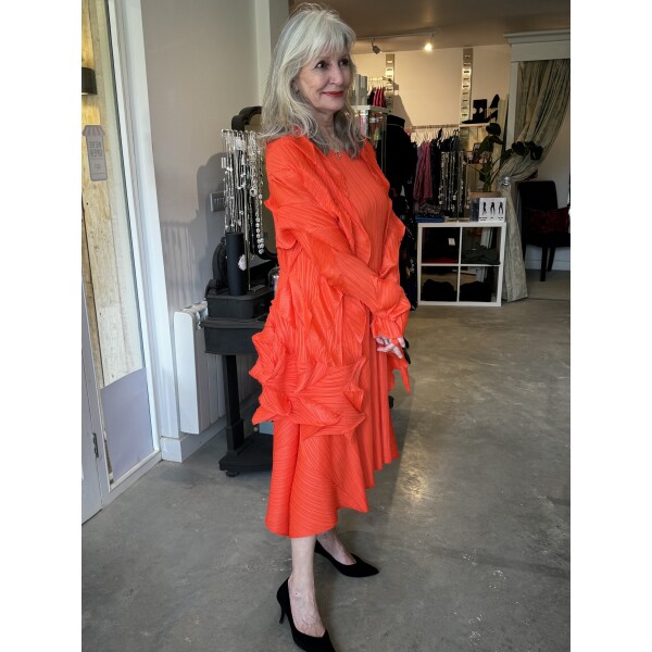 Thanny Sleeveless Plissé Dress and Jacket in Orange is a midi dress in a pleated fabric