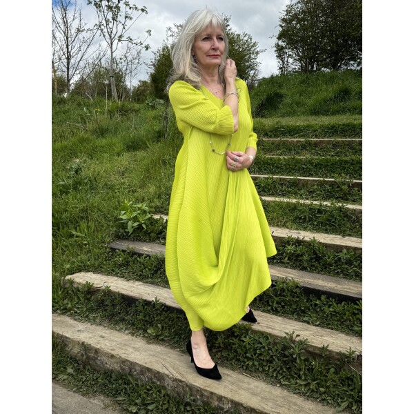 Thanny Asymmetric Plisse Midi Dress in Lime Green has a draping back and front and is made from a stretch plisse fabric