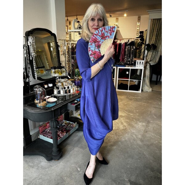 Thanny Asymmetric Plisse Midi Dress in Royal Blue has a draping back and front and is made from a stretch plisse fabric