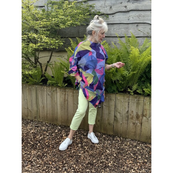 Thanny Plisse Tunic in Lime/Lilac is a colourful and quirky top which combines pleats and folds to form sculptured style