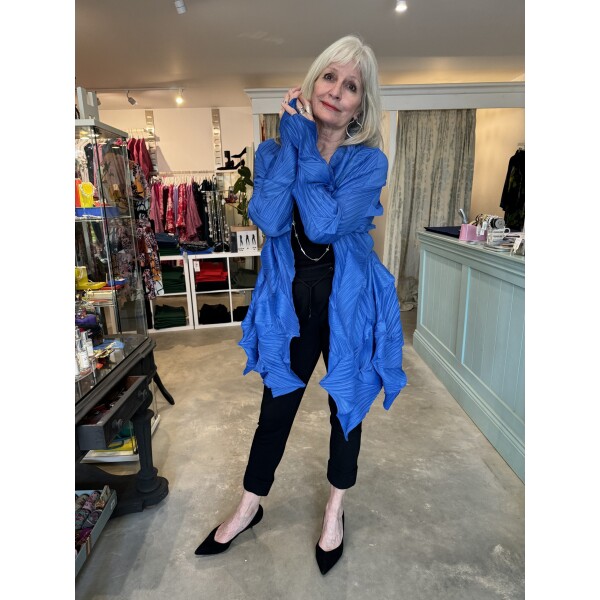 Thanny Long Plisse Jacket in Sky Blue is made from a pleated fabric and has a 3-D peak texture SKY9036