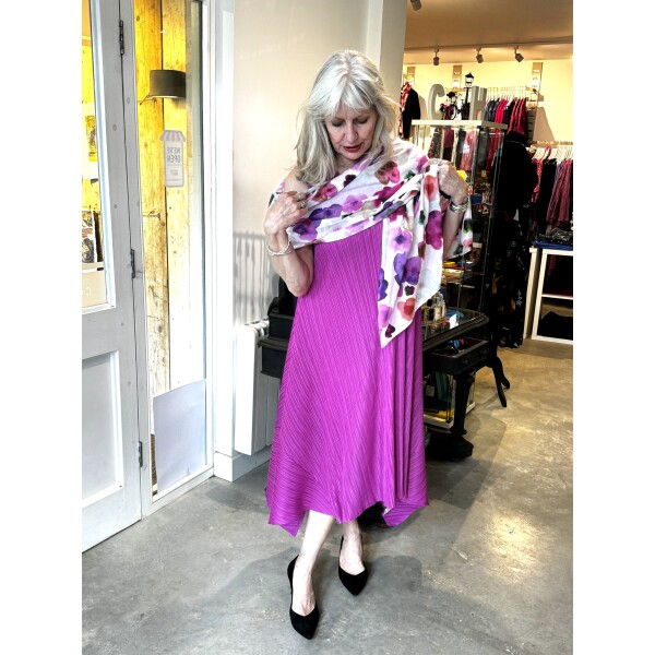 Thanny Sleeveless Plisse Midi Dress SKY17-14 in Fuchsia is a simple dress with dipped hems on the sides
