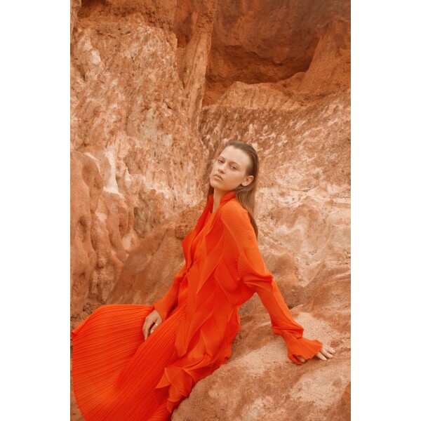 Thanny Sleeveless Plissé Dress and Jacket in Orange is a midi dress in a pleated fabric