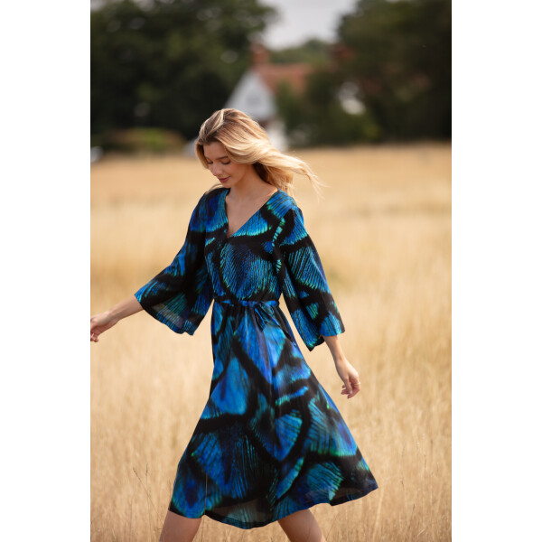 From My Mother's Garden Peacock Dress made of a crepe fabric