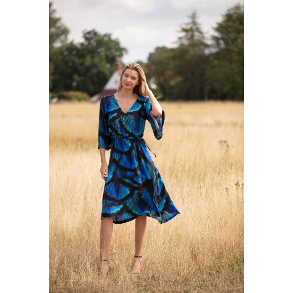 From My Mother's Garden Peacock Dress made of a crepe fabric