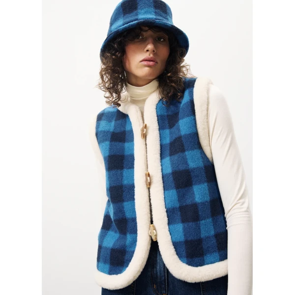FRNCH Simone reversible gilet with a check side in electric blue and a faux fur side in cream