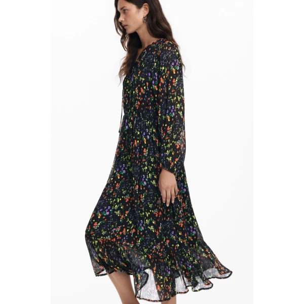 Desigual Kansas City Dress is midi in length and has a pretty, ditsy floral print on a black background 24WWVW53_2000