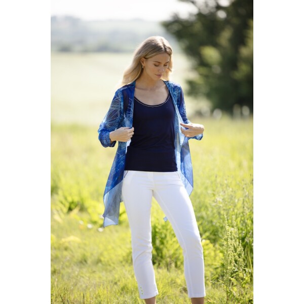 Wishes Long Mesh Shrug by From My Mother's Garden is a lightweight cover-up in a soft tulle fabric. It comes in a Dandelion Clock print in a striking royal blue colour