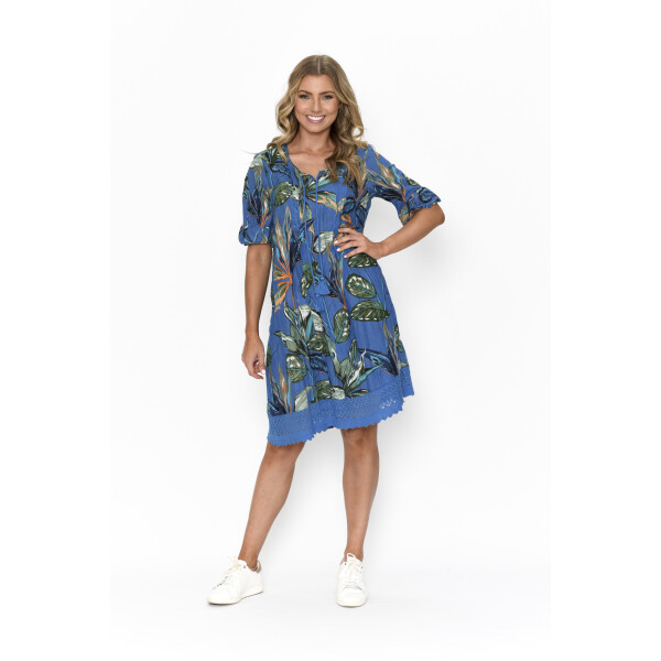 One Summer Hannah Dress in a blue print with lace detailing on the bottom hemline and 3/4 length sleeves