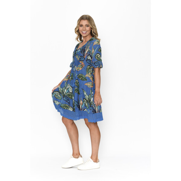 One Summer Hannah Dress in a blue print with lace detailing on the bottom hemline and 3/4 length sleeves