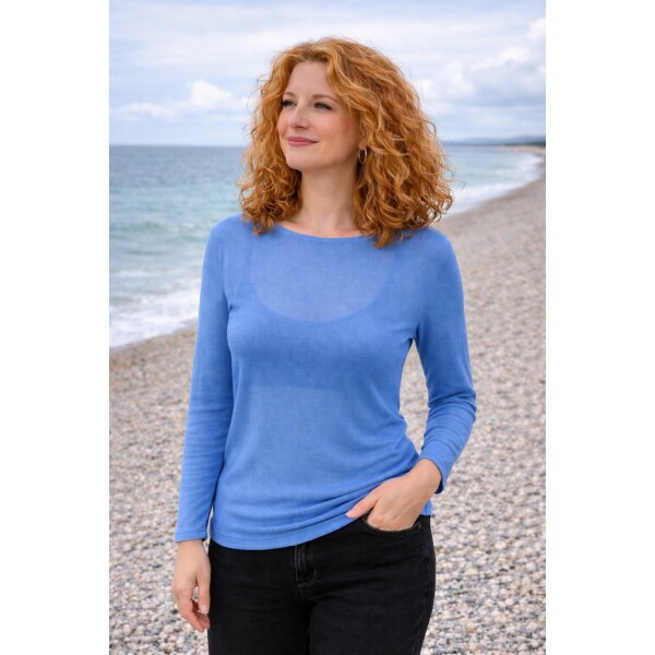 Women wearing soft modal cashmere under top with long sleeves and boat neckline
