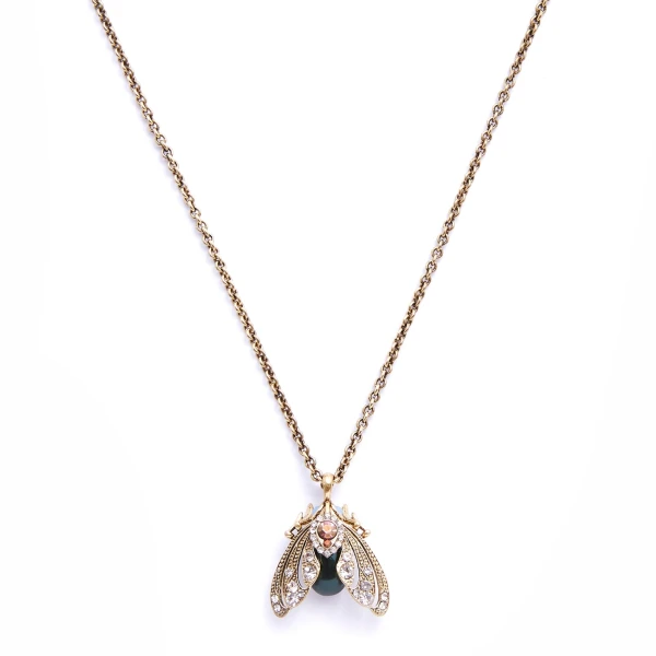 With a touch of vintage, this jewelled moth pendant necklace is just a little bit different! The moth pendant is decorated with synthetic pearls and handset crystals on a 18ct gold-plate construction