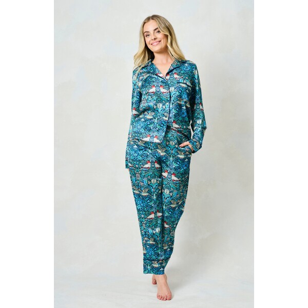 Model wearing Hope & Ivy Maggie Satin Print Pyjamas featuring William Morris Bird design and classic button-up shirt