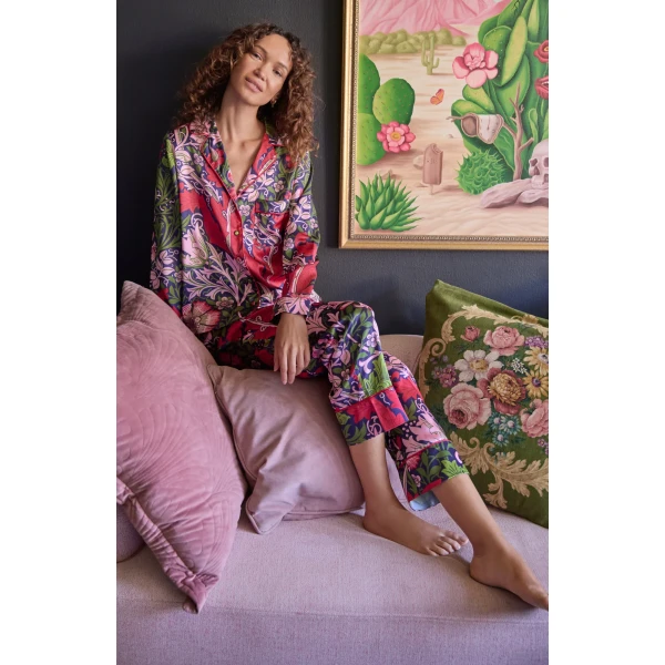 Model wearing Hope & Ivy Marianna Satin Print Pyjamas featuring William Morris Compton design and classic button-up shirt