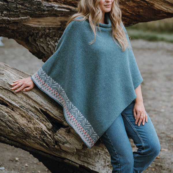 Handmade and inspired by geometric design from patterns and colours found in ceramic tiles in Lisbon, Portugal.  Stay warm and cosy with this lambswool poncho.