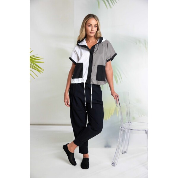 A cornerstone of the Naya Clothing collection, the iconic Naya Cuff Trousers return in classic Black — a timeless shade that delivers maximum versatility.