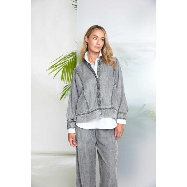 The Naya Washed Effect Tencel Jacket in Graphite is a standout piece from the new season Naya Clothing collection, combining the familiar look of a denim jacket with the softness and comfort that Naya is known for