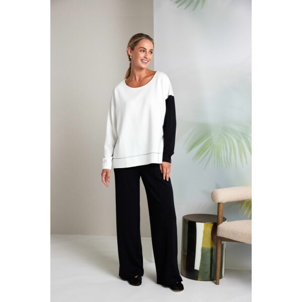 A contemporary essential from Naya Clothing, this straight-line round neck sweatshirt combines clean structure with subtle statement detailing.