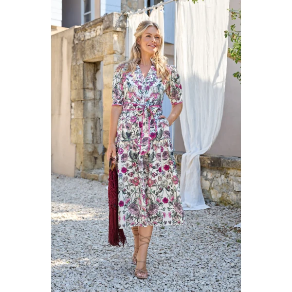 Pink and cream floral dress with tie waist and flowing skirt
